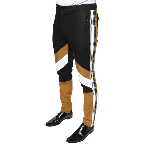 A pair of Dolce & Gabbana multicolor striped trousers with a black, white, and brown design, featuring a flat front and slim fit.
