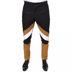 Black, brown, and white pants on a white background