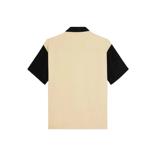 Beige and black shirt on a light gray background