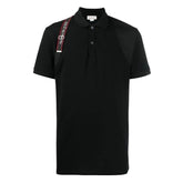 Black polo shirt with a red strap on a white background