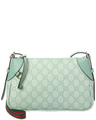 Light blue handbag with Gucci logo and green and red accents on a white background