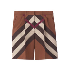 Brown shorts with a geometric pattern on a white background