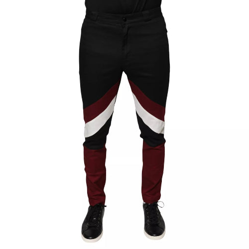 Black sweatpants with red and white stripes on a white background