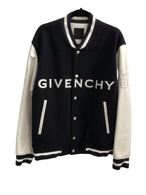 Black and white Givenchy jacket on a hanger with a white background