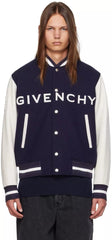 Person wearing a Givenchy varsity jacket on a white background