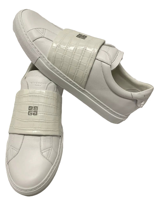 A pair of white Givenchy Urban Street Low Croc Leather Sneakers with box stitching and the brand's logo on the strap.