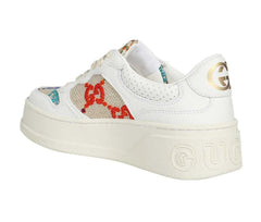 White sneaker with colorful pattern on a white background