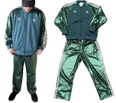 Green shiny tracksuit with Adidas logo on a gray background