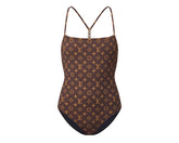 Brown swimsuit with a pattern on a white background