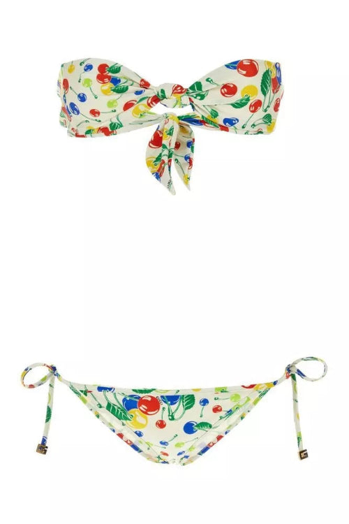 Colorful bikini set with fruit pattern on a white background