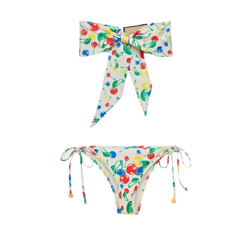 Colorful bikini set with cherry pattern on a white background