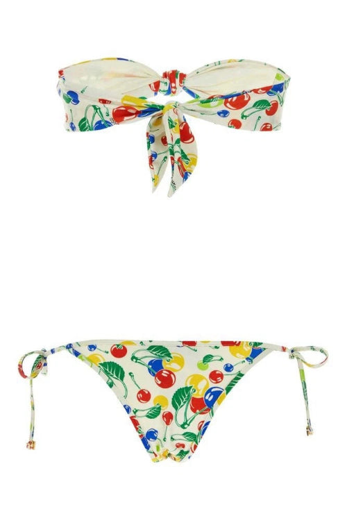 Colorful bikini set with cherry pattern on a white background