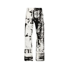 Black and white abstract patterned pants shown against a plain white background.