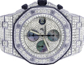 Luxury watch with diamond-studded case on a white background
