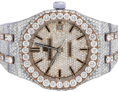 Luxury watch with diamond-studded case and bezel on a white background