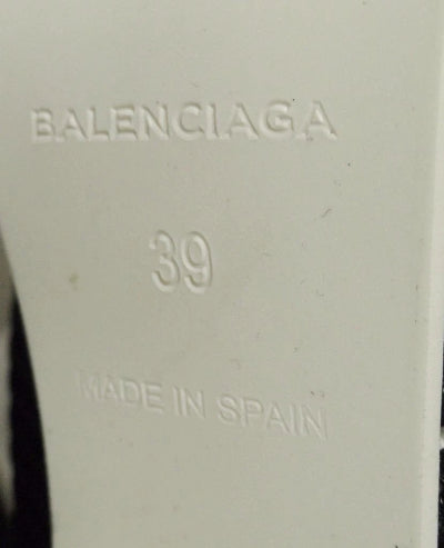 Balenciaga logo and size 39 on a light gray background
