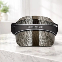 Wooden product with a black strap on a white background