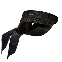 Black perforated visor hat with a matching black necktie, displayed on a white box.