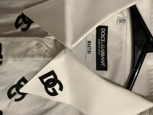 Close-up of Dolce & Gabbana shirt with brand label and logo.