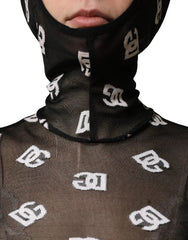 Person wearing a black hood with white logo pattern and sheer brown garment with same logo.