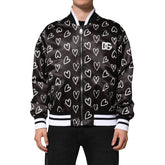 Black jacket with white heart pattern and visible brand logo on a white background