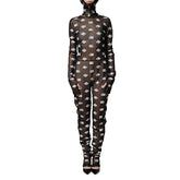Sheer black outfit with white pattern on a white background