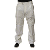 Off-white canvas work pants with a double-leg design, featuring a black top and black shoes on a white background.