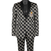 Black and white checkered suit with a decorative patch on a mannequin against a white background