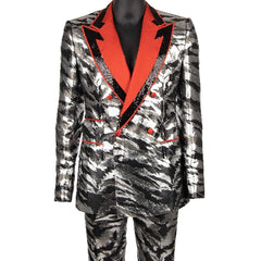 Zebra print suit with red accents on a mannequin against a white background
