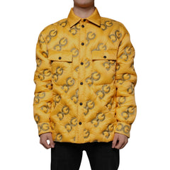 Yellow puffer jacket with a pattern on a white background