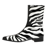 Zebra-striped rain boot on a white background