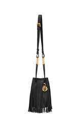 A black leather shoulder bag with gold-tone hardware and a prominent gold circular charm, shown against a plain white background.