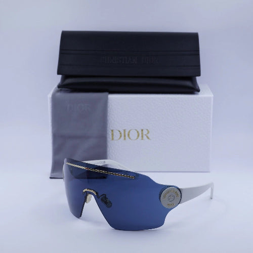 Sunglasses with a Dior box and case in the background