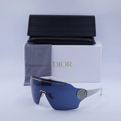 Sunglasses with a Dior box and case in the background