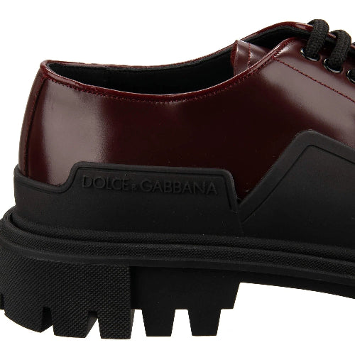Dolce & Gabbana brown leather shoe with black sole on a white background