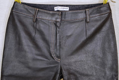 Dark gray pants with a Dolce & Gabbana label on a white background