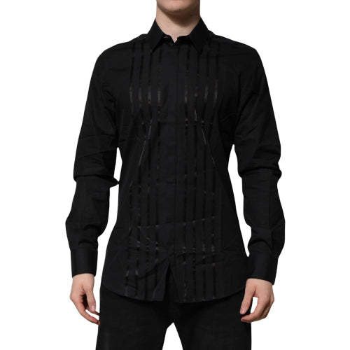 Black long-sleeve shirt with unique design on a white background