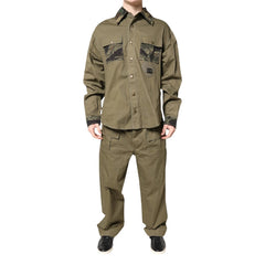 Olive green shirt and pants set on a white background