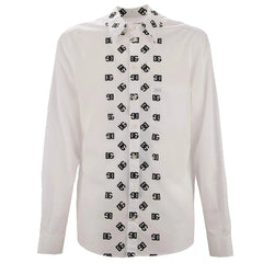 White shirt with black geometric pattern on buttons against a white background