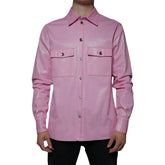 Pink shirt with two front pockets on a white background