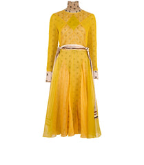 Yellow dress with a belt on a mannequin against a white background