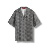 Short-sleeve shirt with geometric pattern on a white background