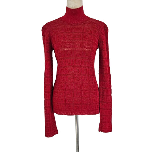 Red turtleneck sweater on a mannequin against a white background