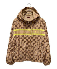 Beige Gucci jacket with logo pattern on a white background