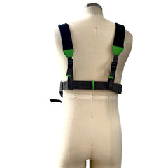 Safety harness on a mannequin with green accents against a white background