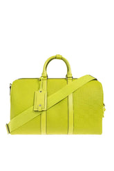 Yellow travel bag with a shoulder strap on a white background