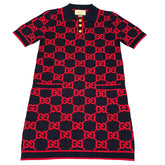 Black dress with red pattern on a light gray background