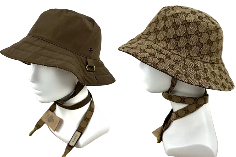 Two hats displayed on a mannequin with a coat in the background
