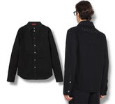 A black long-sleeve button-up shirt shown from both the front and back views, with a model wearing it from the back on the right side.