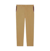 A pair of tan chinos with distinctive red and green striped side panels on the hips, shown flat against a white background.